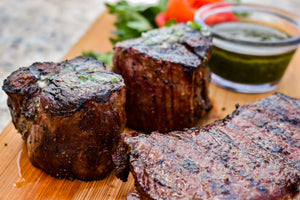 Grilled Filets on Cutting Board with bowl with Cilantro Pesto