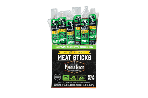 An open case of Wagyu Jalapeno Cheddar Snack Sticks from Marble Ridge Farms